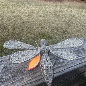 Handmade of stainless steel wire dragon fly book topper.